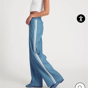 SPRWMN blue w/white stripe leather track pants